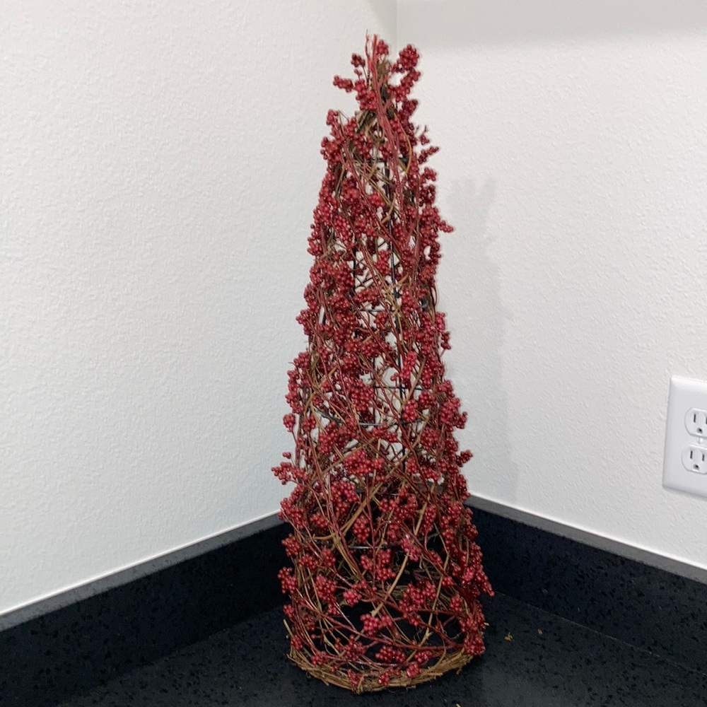 Grapevine and wire cone tree with red berries